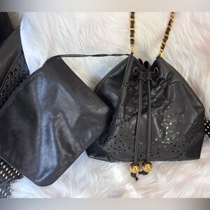 Authentic CHANEL perforated bucket black leather with pouch